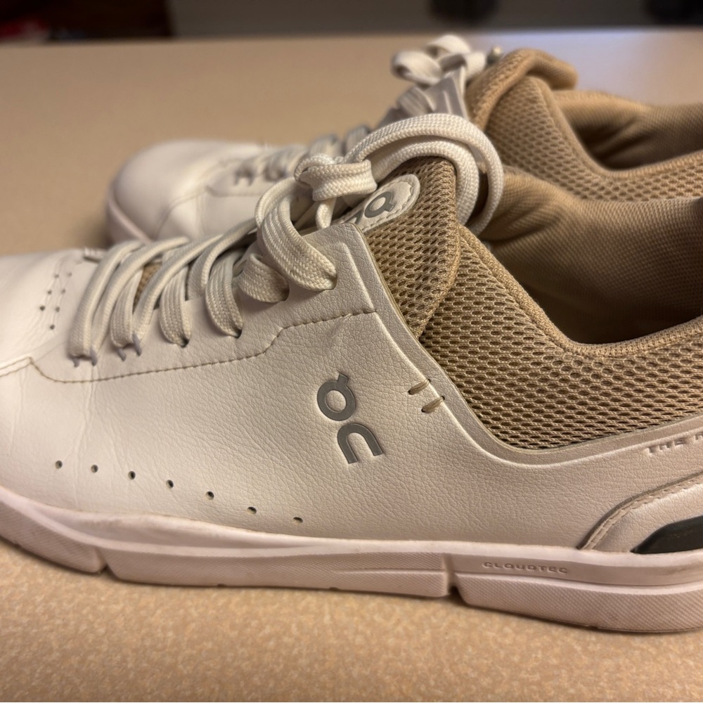 On Running White and Tan Athletic Shoes